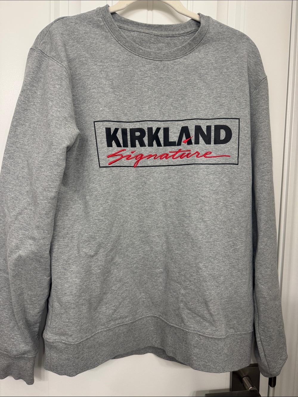 Kirkland Signature Grey Crewneck Sweatshirt with Black and Red Logo
